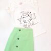 Conjunto para niña, blusa blanca con estampado de lentejuela color plata, falda verde menta.